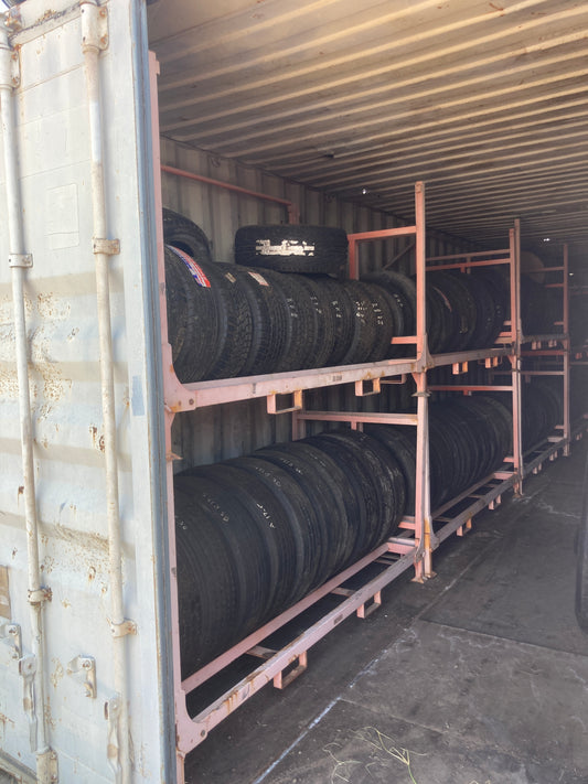 40" Container full of tyres and Tyre racks
